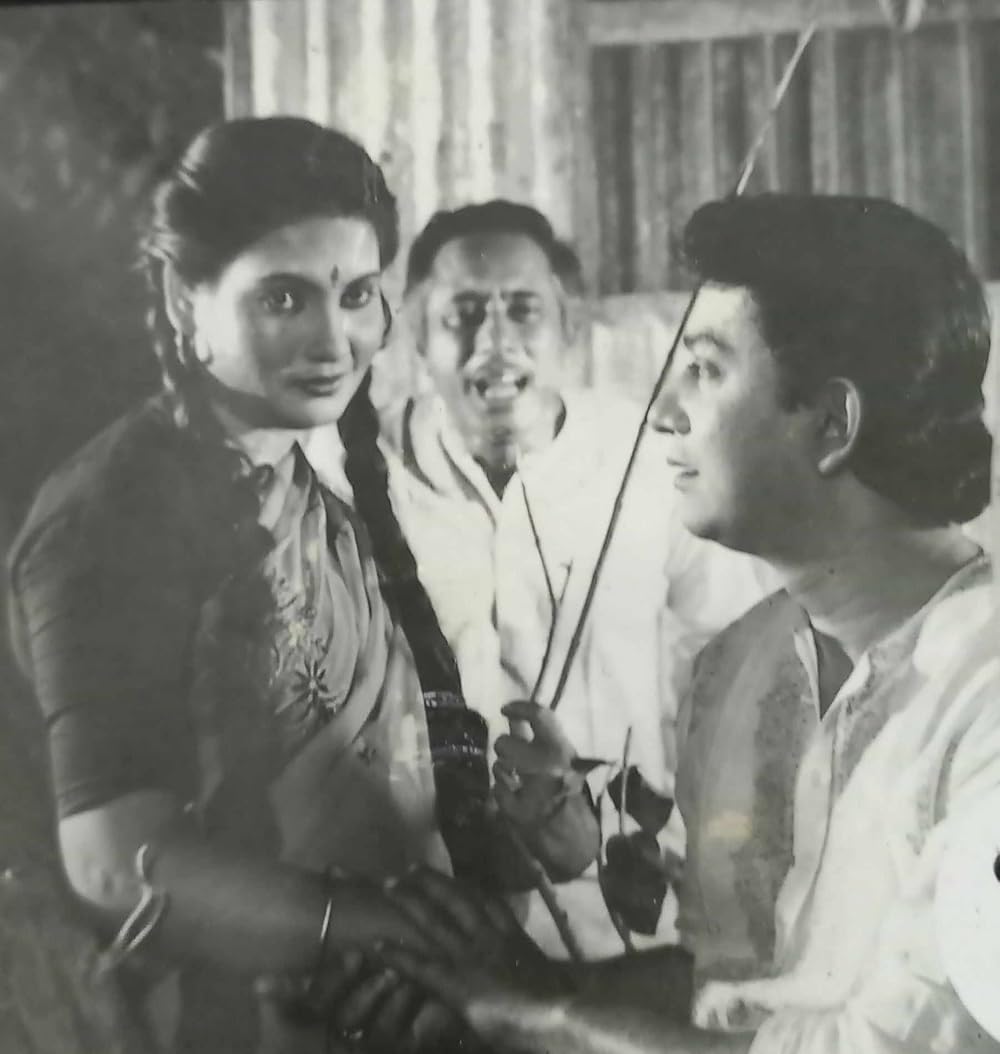 Probir Mitra, Anwar Hossain, and Jahanara Bhuiyan in Sindur Niona Muchhe (1993)