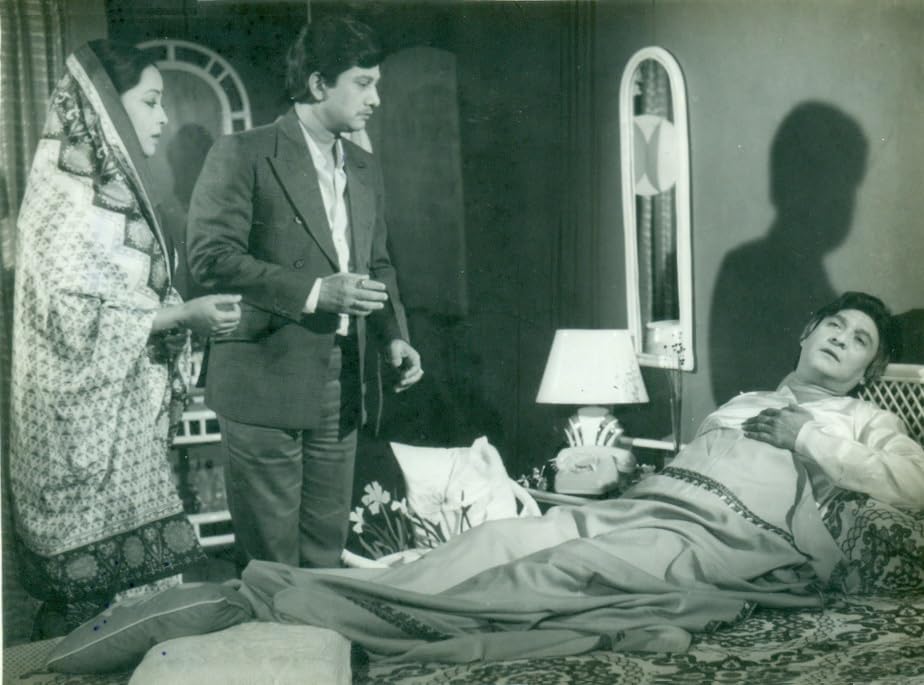 Probir Mitra, Shaukat Akbar, and Sharmili Ahmed in Abishkar (1989)